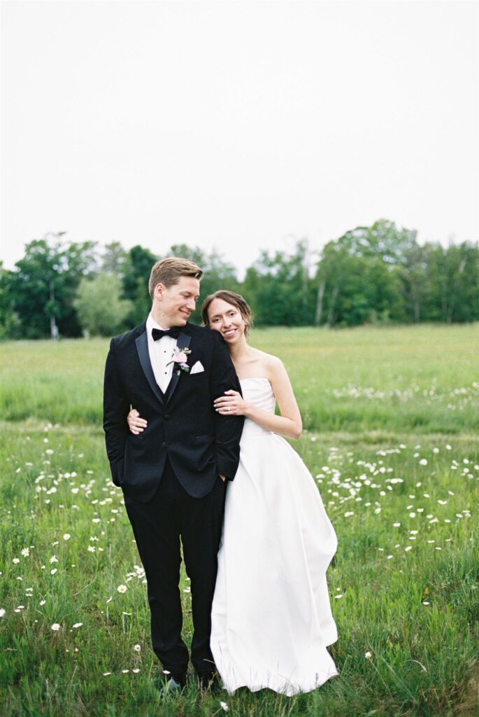 Couple embracing at Northern haus wedding venue in Door County, Wisconsin