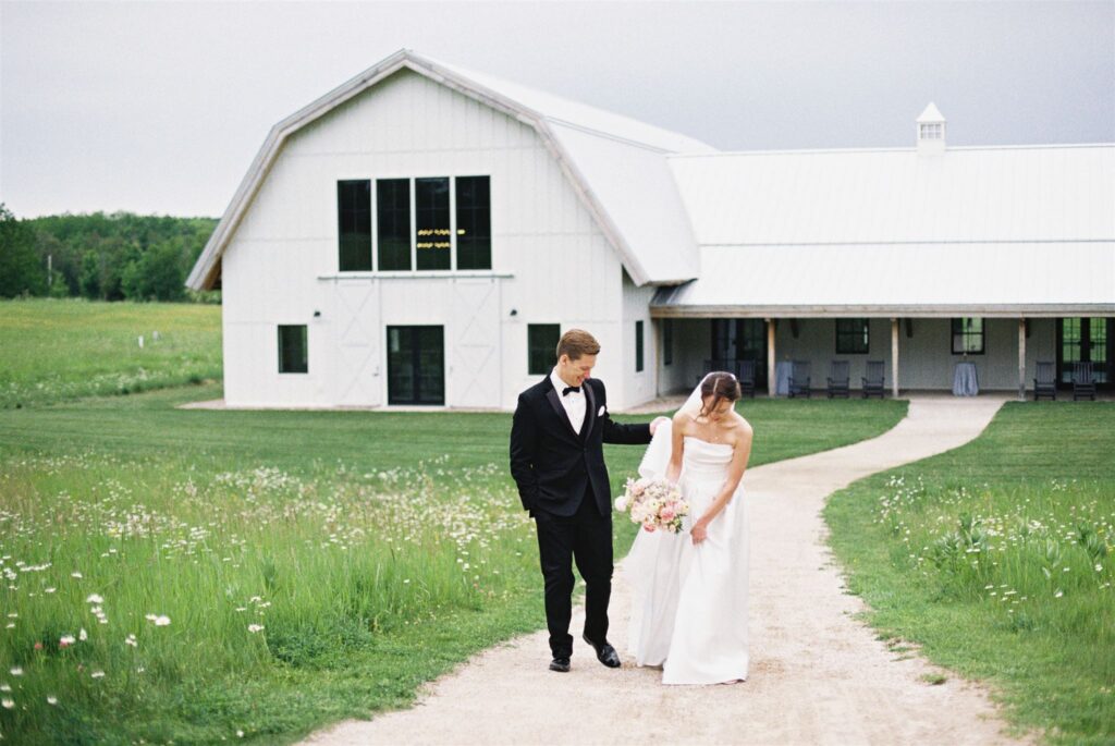 bride and groom walking at Northern Haus photos by Emily Barbara